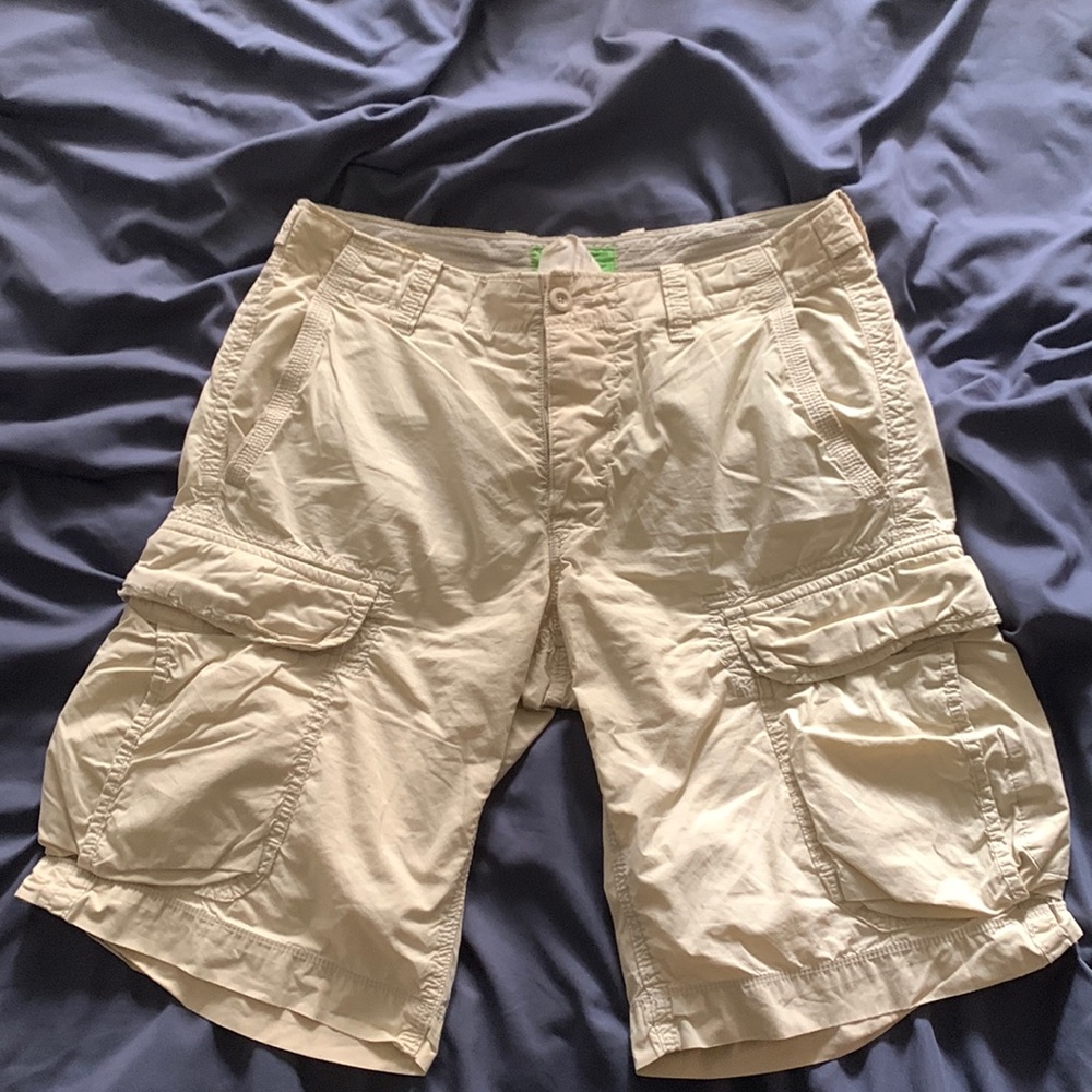 baggy vintage khaki cargo shorts, have some wear on left pocket